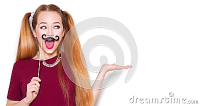 Funny teenage girl with paper mustache on stick Stock Photo