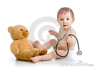 Funny toddler weared diaper with plush toy Stock Photo