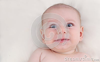 Funny unsure scared baby Stock Photo