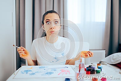 Funny Woman Painting Staining her Clothes with Acrylics Stock Photo