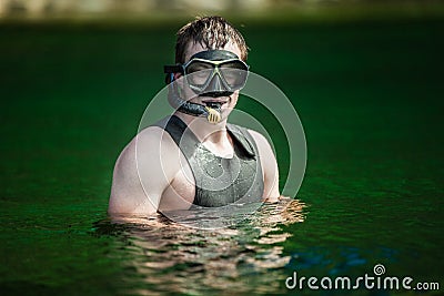 Funny Young Adult Snorkeling in a river Stock Photo