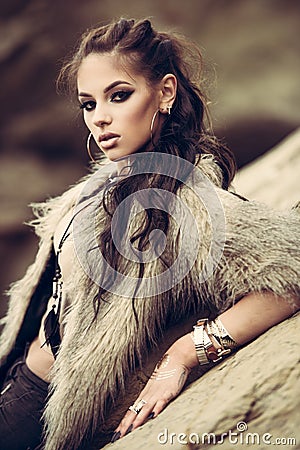 Fur coat and flash tattoos Stock Photo