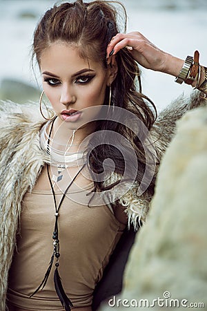 Fur coat and flash tattoos Stock Photo