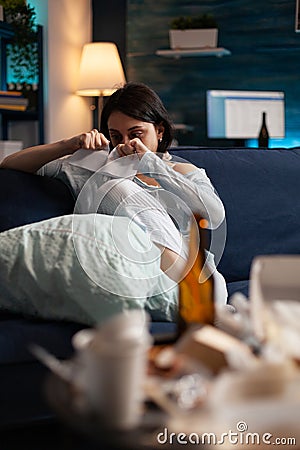 Furious, annoyed, desperate, frustrated woman ripping paper letter Stock Photo