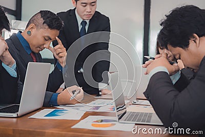 Furious boss scolding frustrated woman at office. irritated man Stock Photo