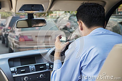 Furious driver at the traffic jam Stock Photo