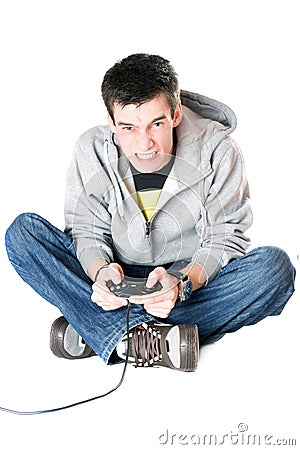 Furious guy with a joystick for game console Stock Photo