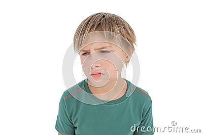 Furious little boy looking down Stock Photo