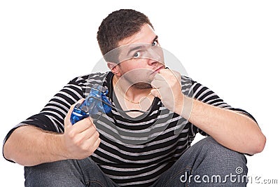 Furious man with a joystick for game console Stock Photo