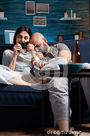 Furious nervous couple losing online videogames championship Stock Photo