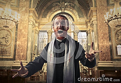 Furious priest Stock Photo