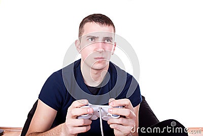 Furious young man with a joystick Stock Photo