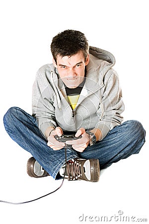 Furious young man with a joystick for game console Stock Photo