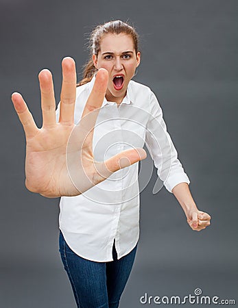 Furious young woman for self-defense, anger or rebellion Stock Photo