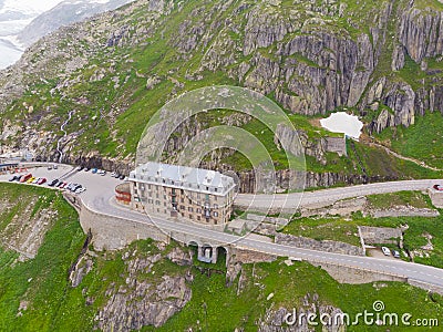 Iconic Belvedere hotel on Furkpass mountain road in Swiss Alps close to Obergoms, Switzerland. Editorial Stock Photo