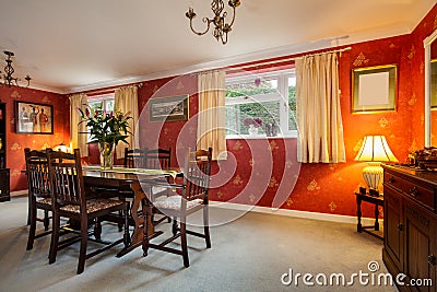 Furnished dining room with red wallpaper Editorial Stock Photo