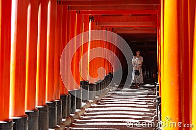 Fushimi Inari-taisha Shrine. Thousands countless vermilion Torii gates on a hill Editorial Stock Photo