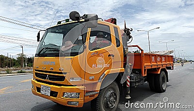 FUSO TRUCKS FM1524 WITH FASSI KNUCKLE BOOM CRANE Editorial Stock Photo