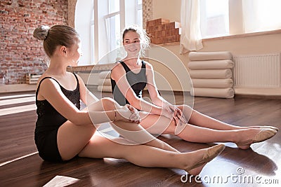 Future ballerinas. Jolly girls friendship Stock Photo