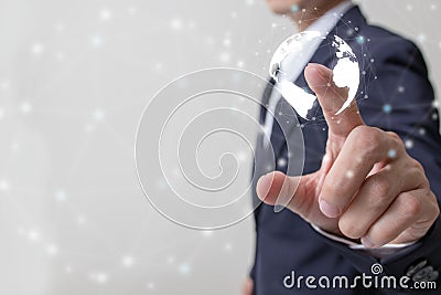 Future of financial business concept,Businessman touching increasing graph with finance symbols. Stock Photo