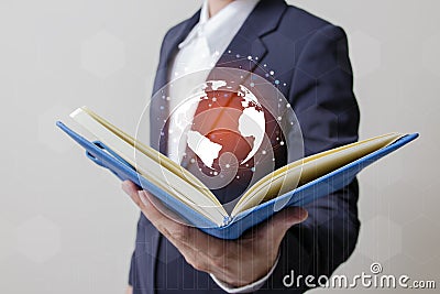 Future of technology network concept,Businessman holding worldwide network . Stock Photo