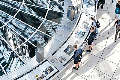 Futuristic architecture of a Glass Dome with crowds of people on the roof of the Reichstag building Editorial Stock Photo