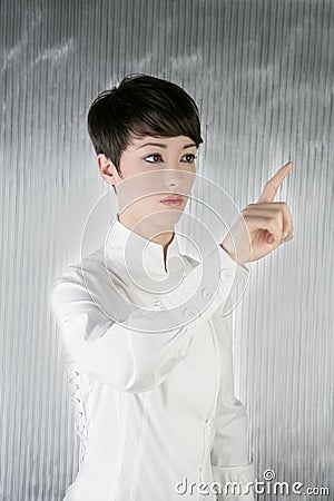 Futuristic businesswoman finger touching pad Stock Photo