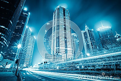 Futuristic city with light trails Stock Photo