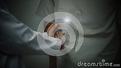 A Doctor Scanning Patient`s Backbone Stock Photo