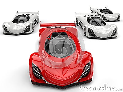 Futuristic concept race sports cars racing - red in front of all the white ones Stock Photo