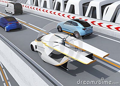 Futuristic flying car driving on the highway Stock Photo