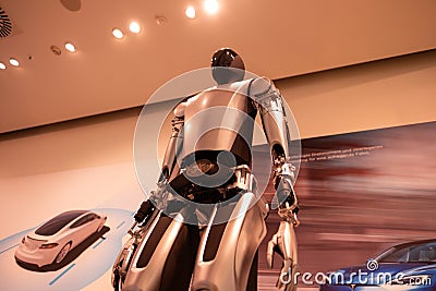futuristic humanoid robot named Tesla Bot AKA Optimus, modern environment, showcasing advanced robotics technology, engineering, Editorial Stock Photo