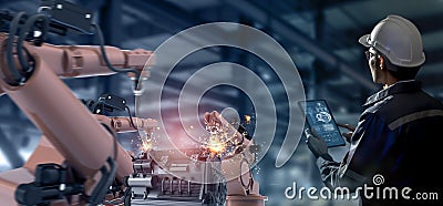 Futuristic industry technology concept, engineer using high technology including 5g, artificial intellingence, robot, augmented mi Stock Photo