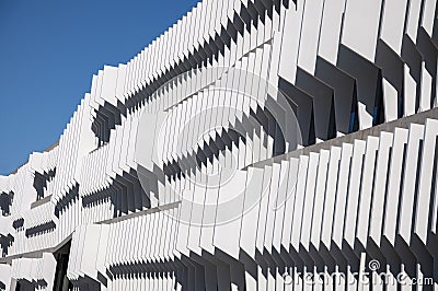Futuristic part of building design on clear blue sky background. Abstract facade design. Modern city architecture. Editorial Stock Photo