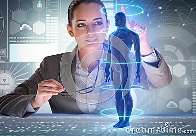 The futuristic remote diagnostics concept with businesswoman Stock Photo