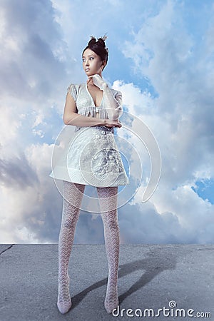Futuristic young asian woman in full lenght. Stock Photo