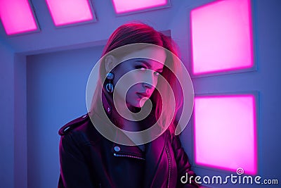 Futuristic style portrait in blue and purple light. Stock Photo