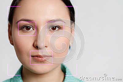 Futuristic and technological scanning of the face of a beautiful woman for facial recognition and scanned person. It can serve to Stock Photo