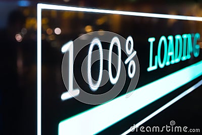 Futuristic transparent OLED screen dashboard illuminate blue pixel light and real-time display 100% loading status bar. Stock Photo