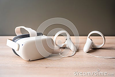 Futuristic white virtual reality goggles and earphones Stock Photo