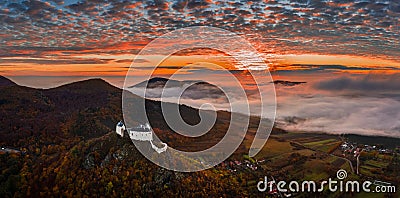 Fuzer, Hungary - Aerial panoramic view of the beautiful Castle of Fuzer with amazing colorful sunrise sky and clouds at autumn Stock Photo