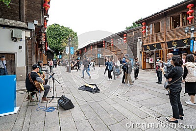 Fuzhou Ancient Commercial Street and stray singer Editorial Stock Photo