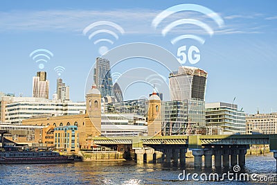 5G concept in the city. Many wireless symbols on the top of the buildings Stock Photo