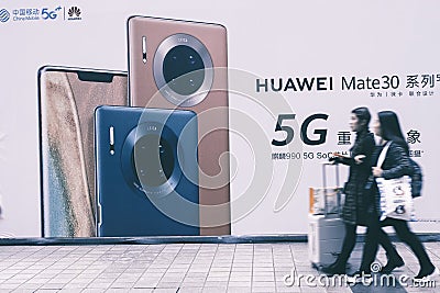 HUAWEI Mate 30 5G mobile phone billboard Editorial Stock Photo