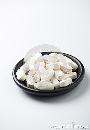 GABA GAMMA-AMINOBUTYRIC ACID Tablets. Concept for a healthy dietary supplementation. Stock Photo
