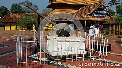 Gada or blunt mace at the indian temple of puliyoor Stock Photo
