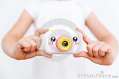 The gadgets for kids. Children's usefull toys: photo camera. White background Stock Photo