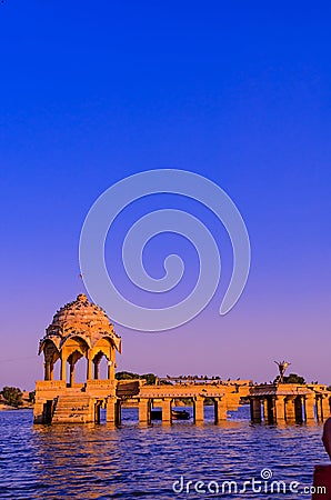 The Gadisar Lake on outskirts of Jaisalmer city with temples, gateways, ghats and pavilions Editorial Stock Photo