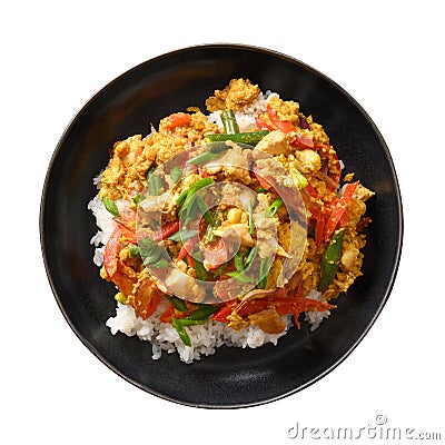 Gai Pad Pongali with chicken, eggs, spicy, yellow thai curry paste on rice. Stock Photo