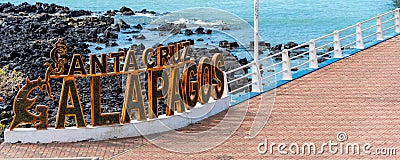 GALAPAGOS ISLAND, SANTA CRUZ - JULY 2, 2019: 3D letters `Santa Cruz Galapagos` at the pier Editorial Stock Photo